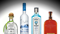 Bottles of Patrón, Grey Goose, Bombay Sapphire, and Woodford Reserve available at Penthouse Club in New Orleans, LA